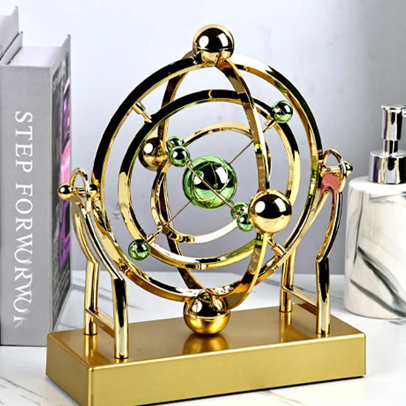 Pendule à mouvement perpétuel en orbite céleste - Décoration rotative créative pour la maison